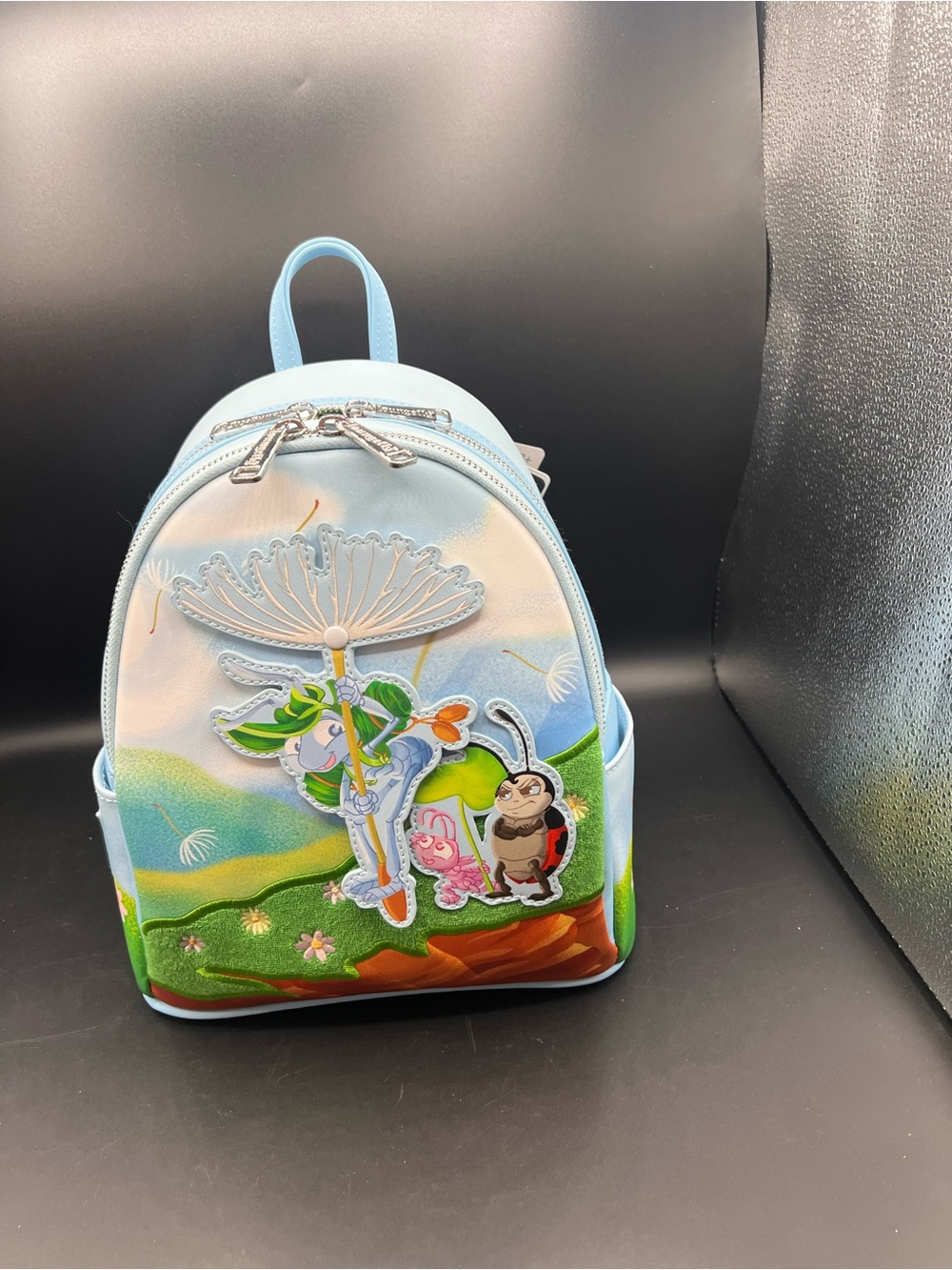 Loungefly Light Blue Kids Character Mini Backpack with Garden Scene